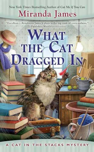 What the Cat Dragged In: A Cat In the Stacks Mystery #14