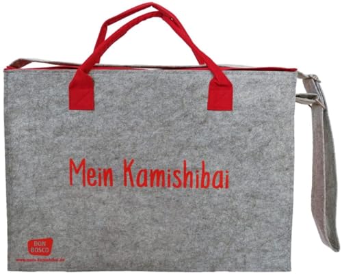 Umhängetasche "Mein Kamishibai". Modell 2019, Grau (Zubehör für das Erzähltheater Kamishibai): Modell 2022. Grauer Filz, rote Seitenteile, verstärkter ... die Hand, längenverstellbarer Schulterriemen von Don Bosco